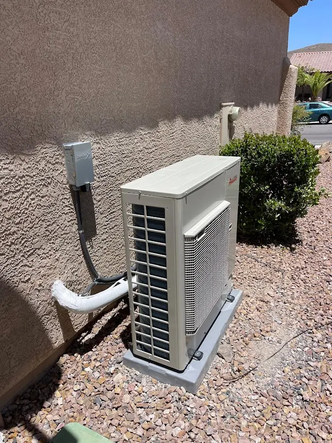 Residential air conditioning condenser unit in Midway City